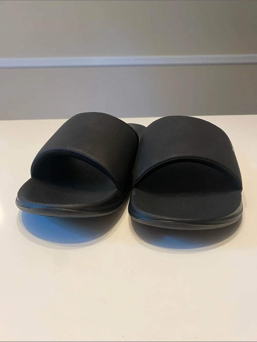 Reef Men’s Black Slide Sandals with White Logo